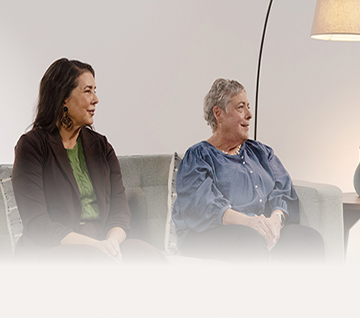 Three women sitting and having a conversation