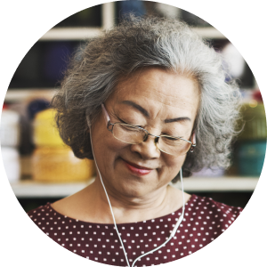 Elderly woman with glasses smiling